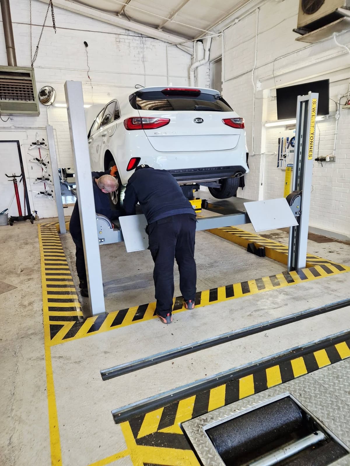 Mechanic working on a car